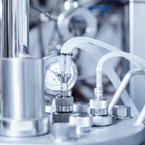 Close-up of a stainless steel bioreactor system
